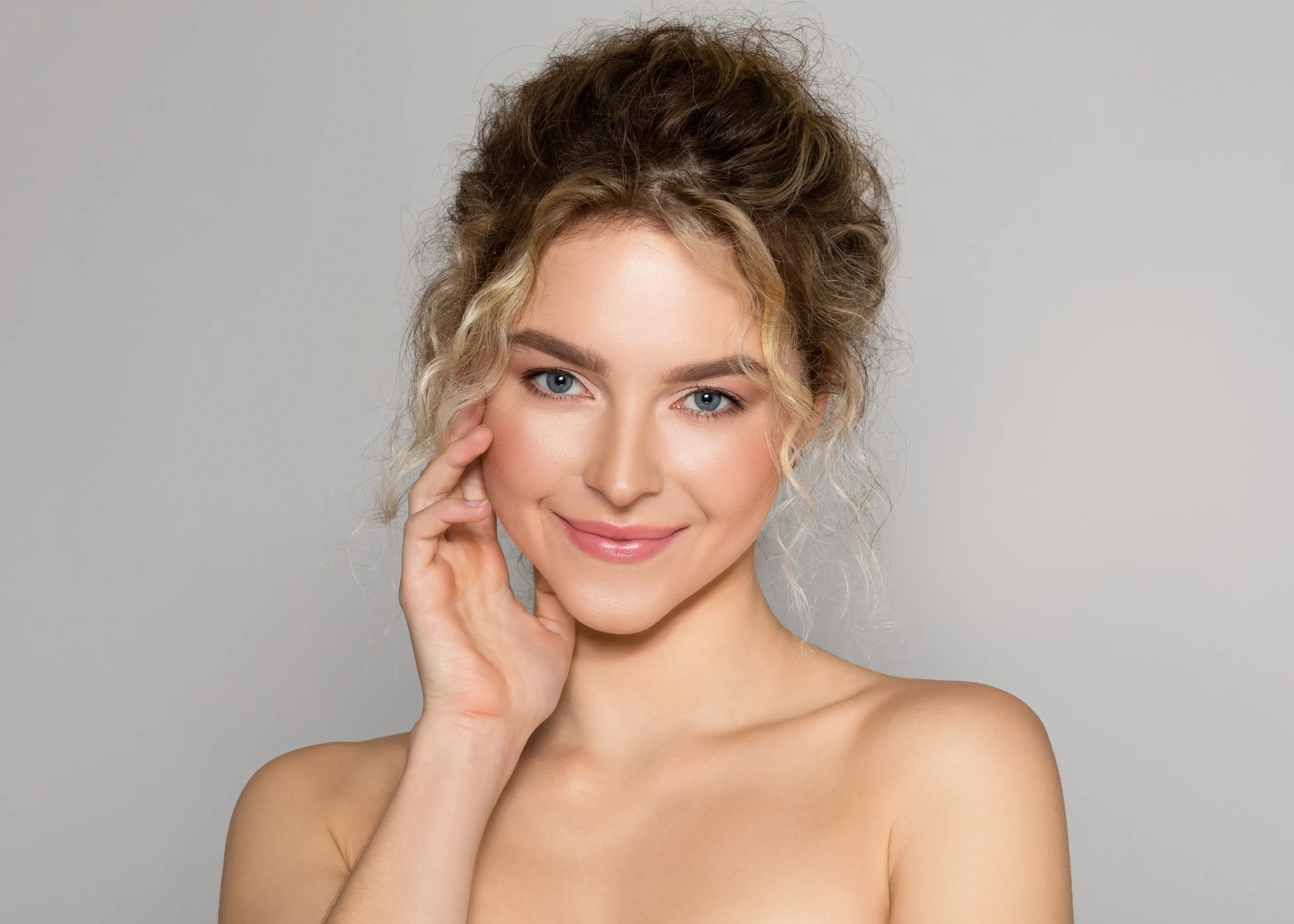 Refined, radiant skin after a skin tightening treatment at Aayu Aesthetics